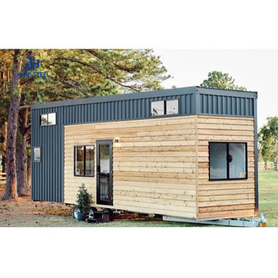 Casa de contêiner pré-fabricada com feixe de aço sólido em forma de H e porta de painel de sanduíche