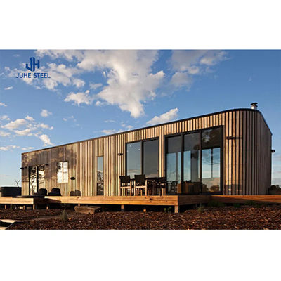 Casa de contêiner pré-fabricada com feixe de aço sólido em forma de H e porta de painel de sanduíche